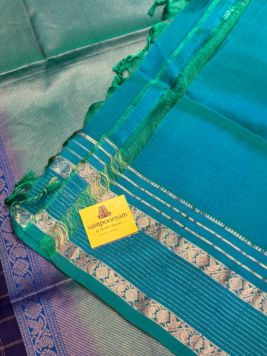 Dark Blue with Light Blue, rich zari butta with zari checks all over the body, Rettapet traditional borders and rich Pallu Pure Soft Silk Saree