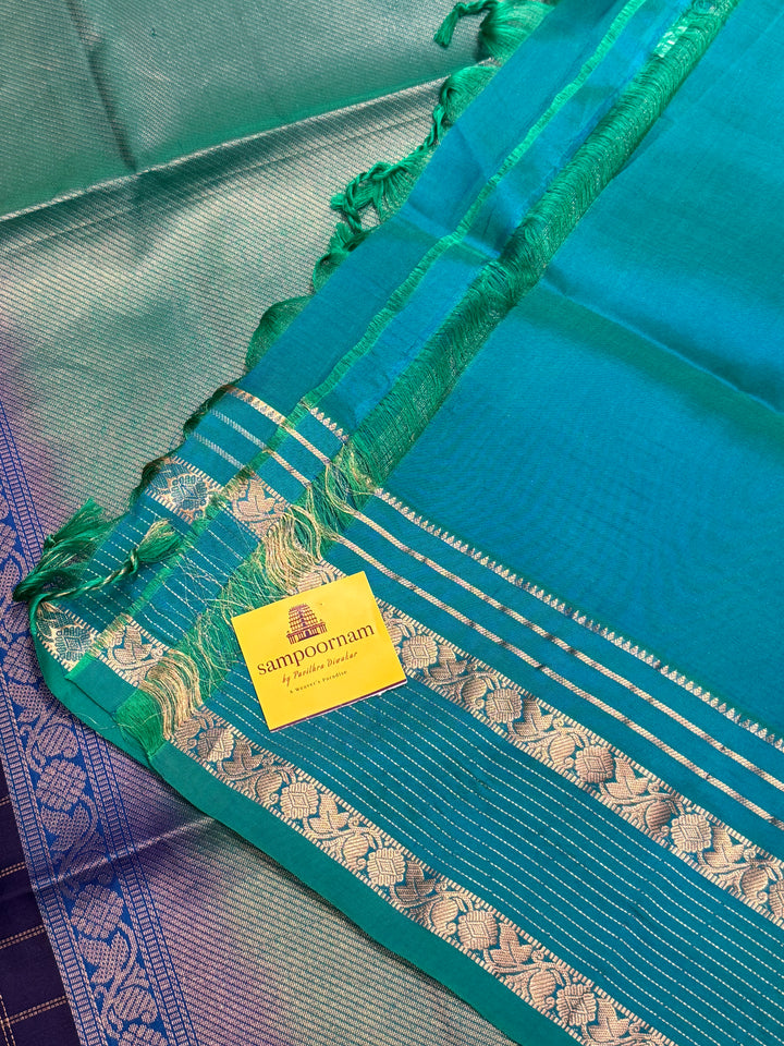 Dark Blue with Light Blue, rich zari butta with zari checks all over the body, Rettapet traditional borders and rich Pallu Pure Soft Silk Saree