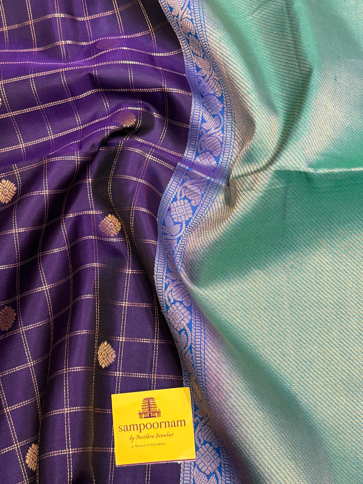 Dark Blue with Light Blue, rich zari butta with zari checks all over the body, Rettapet traditional borders and rich Pallu Pure Soft Silk Saree