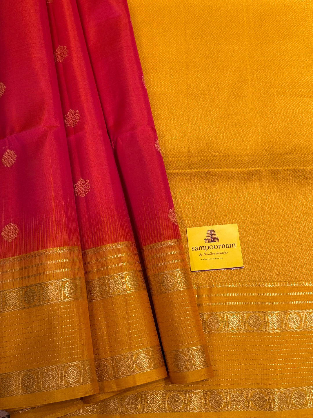 Reddish Pink With Yellow, traditional rettapet border, rich zari butta in the body and grand pallu Pure Soft Silk Sarees