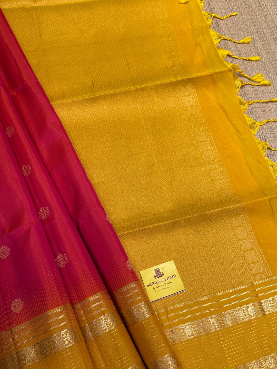 Reddish Pink With Yellow, traditional rettapet border, rich zari butta in the body and grand pallu Pure Soft Silk Sarees