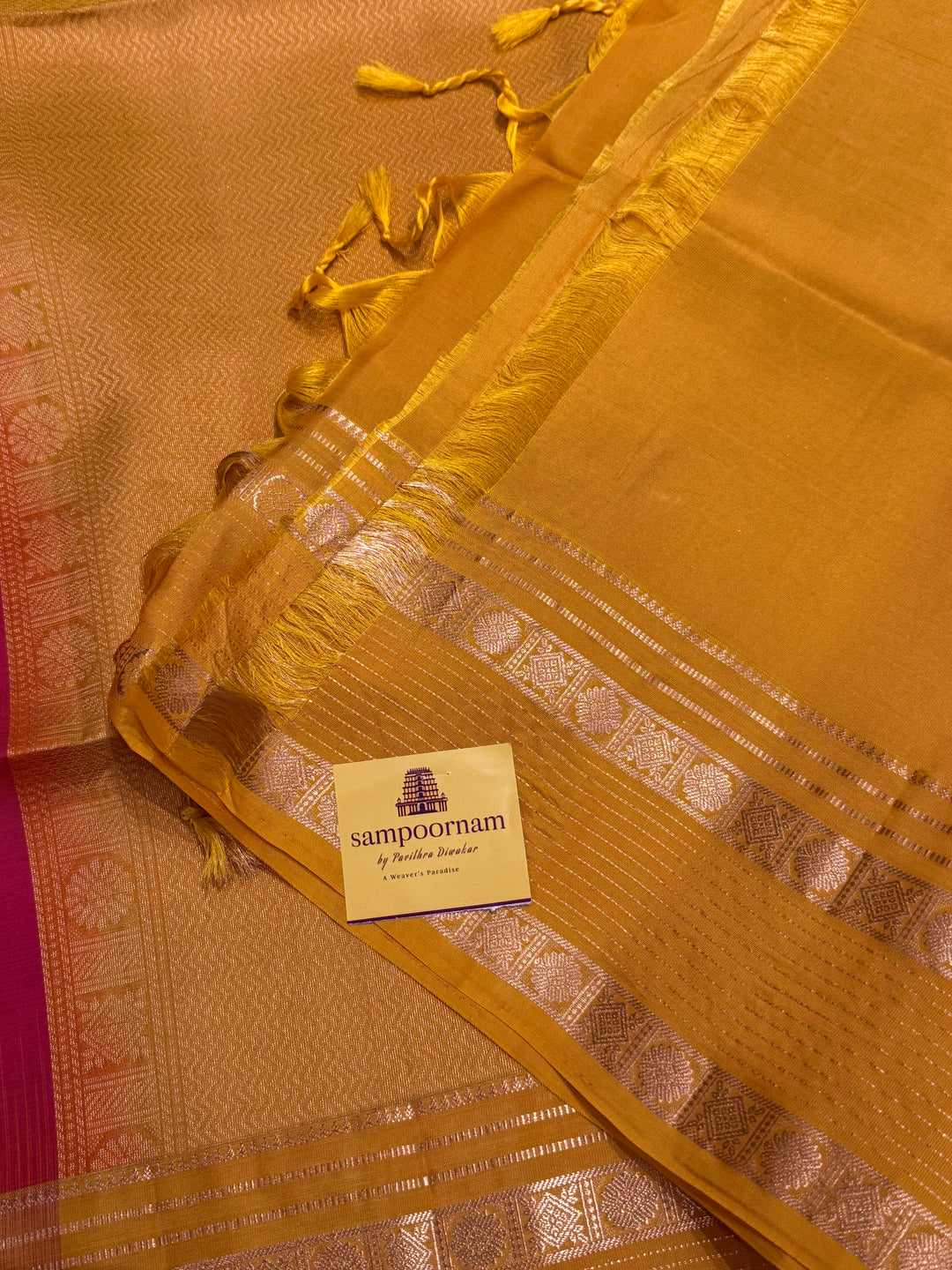 Reddish Pink With Yellow, traditional rettapet border, rich zari butta in the body and grand pallu Pure Soft Silk Sarees