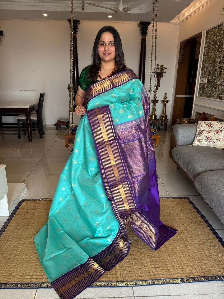 Light Blue with Dark Blue ,Kanchi Rich Border with Annam and Chakram Rich Butta in the Body and Grand Pallu Korvai Silk Cotton Saree
