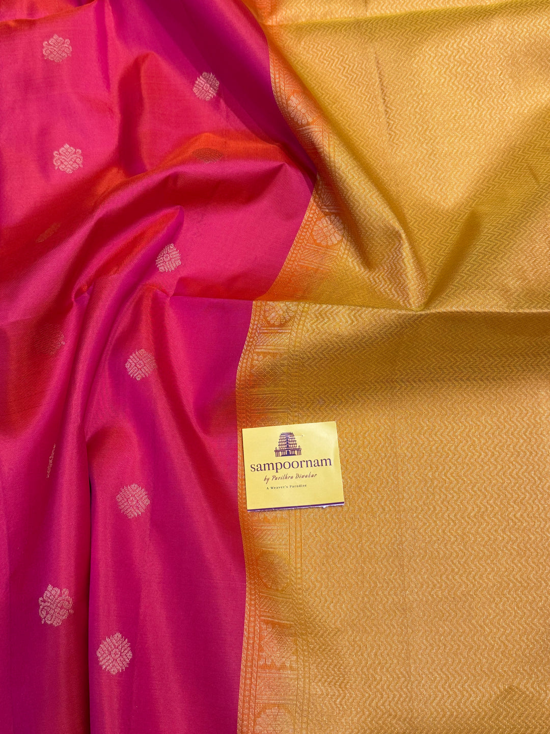 Reddish Pink With Yellow, traditional rettapet border, rich zari butta in the body and grand pallu Pure Soft Silk Sarees