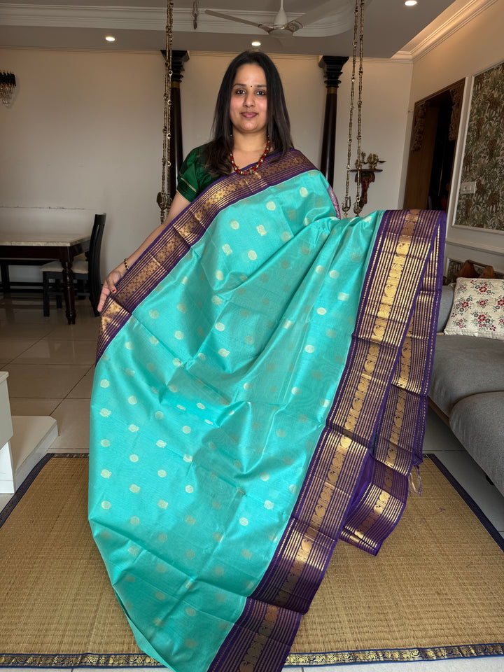 Light Blue with Dark Blue ,Kanchi Rich Border with Annam and Chakram Rich Butta in the Body and Grand Pallu Korvai Silk Cotton Saree