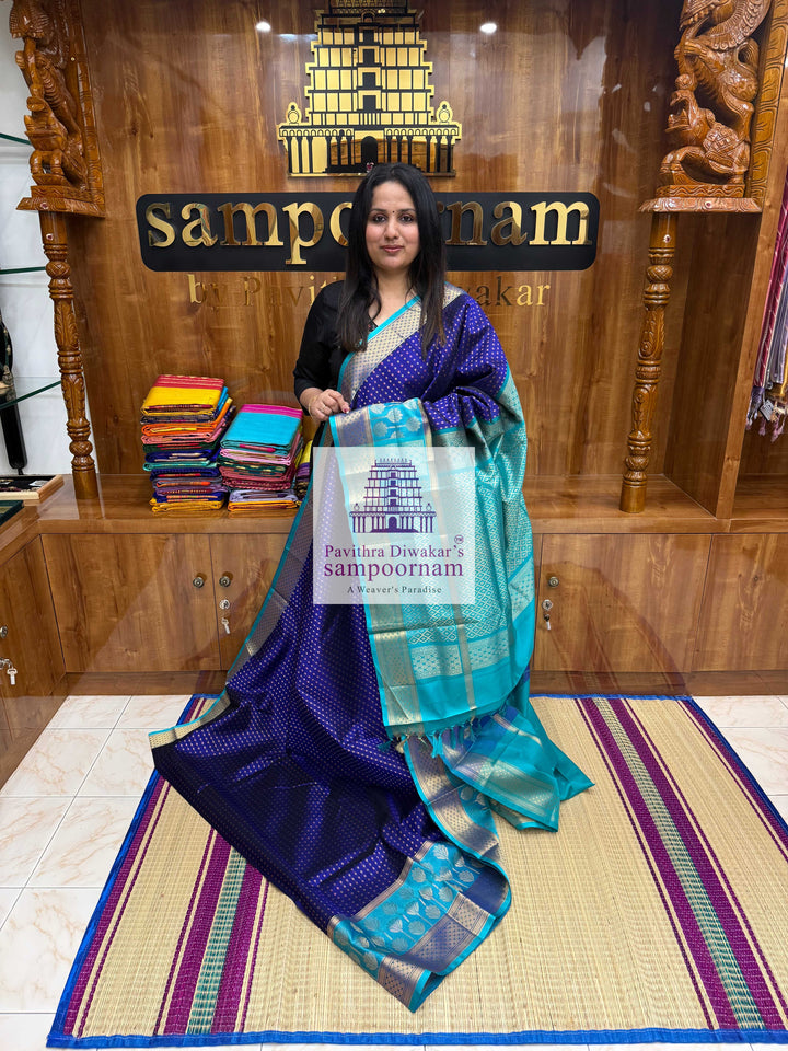 MS Blue with Turquoise Blue , Zari butta in the body , one side big Satin border with Floral motif , traditional border and  Grand Pallu Korvai Silk Cotton Saree
