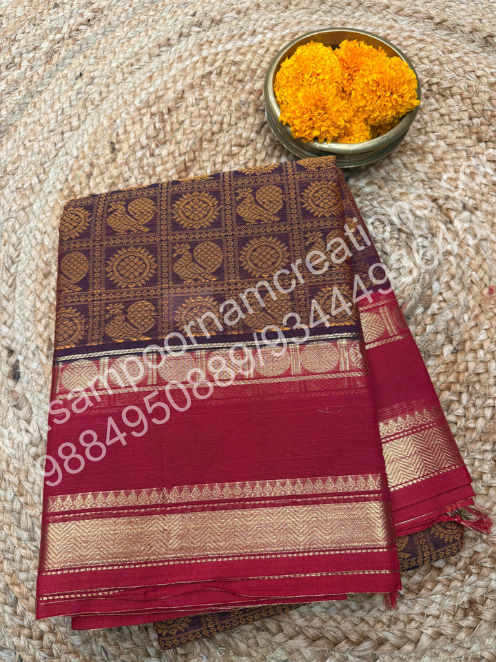 Maroon with Red , Rich Mayil and Chakram thread work in the body with Rettapet border , rich Pallu Pure Chettinad Cotton Saree