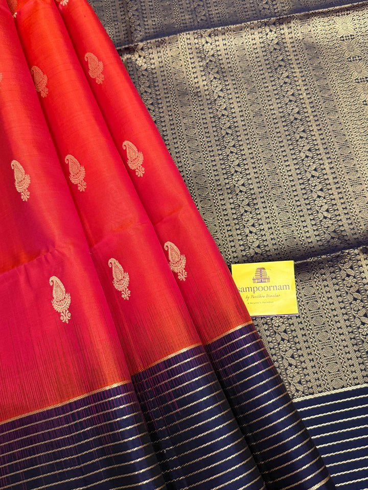 Deep Red With Dark Blue,vairaoosi lines in the borders, rich mango zari butta in the body and grand Pallu Pure Soft Silk Saree