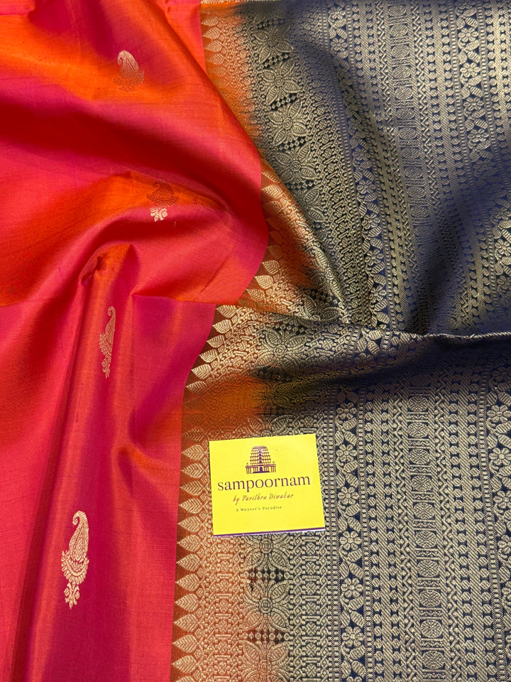 Deep Red With Dark Blue,vairaoosi lines in the borders, rich mango zari butta in the body and grand Pallu Pure Soft Silk Saree