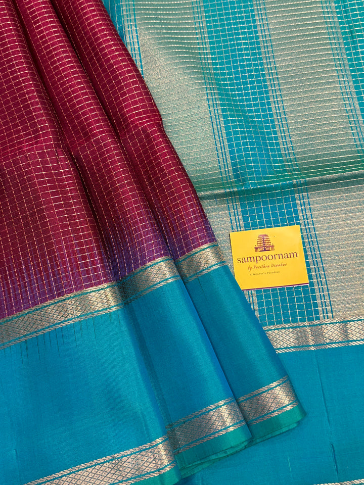 Dark Jamun  With Turquoise Blue ,rich zari podi kattam in the body,traditional rettapet borders and rich Pallu Pure Soft Silk Saree