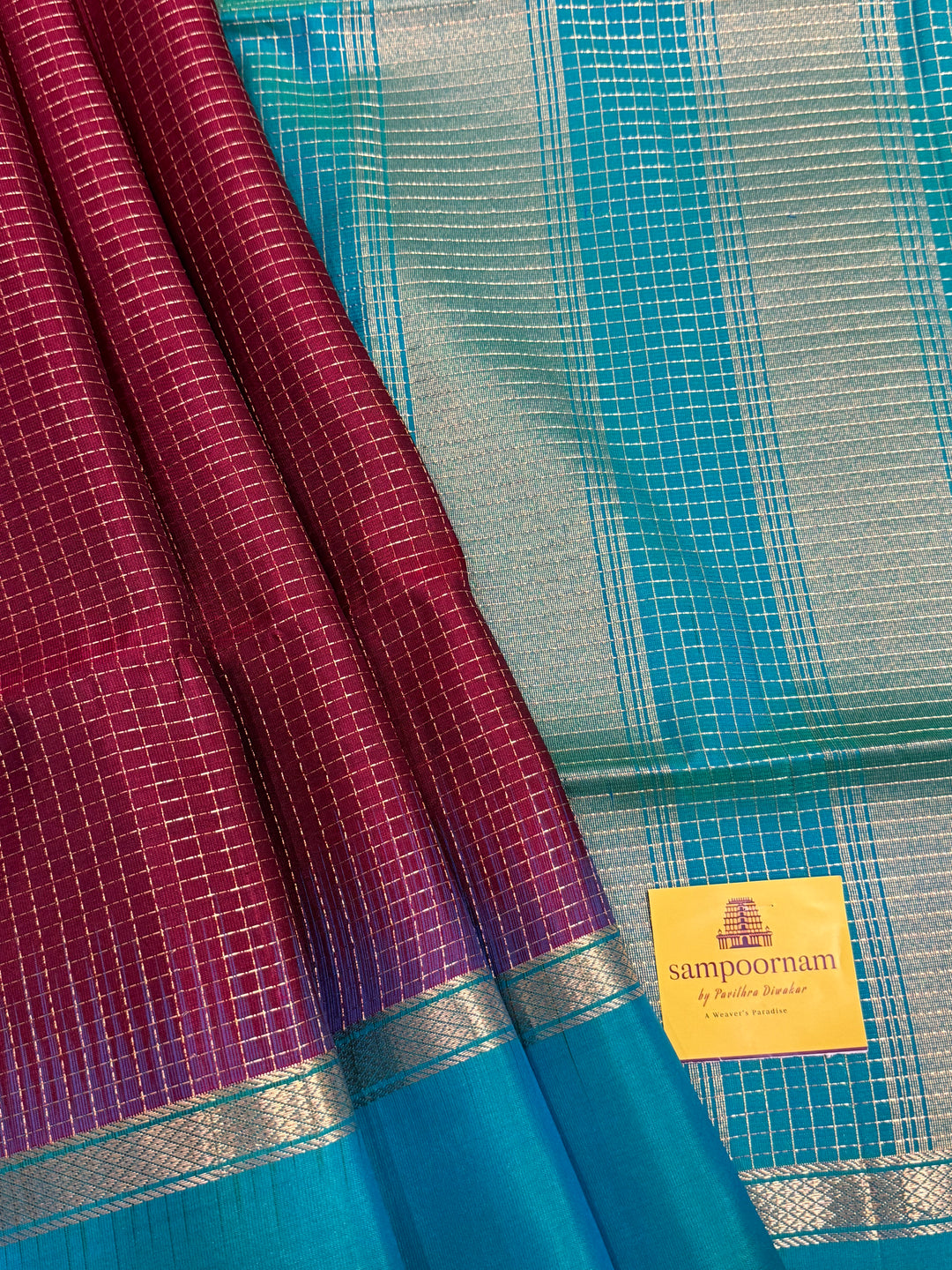 Dark Jamun  With Turquoise Blue ,rich zari podi kattam in the body,traditional rettapet borders and rich Pallu Pure Soft Silk Saree