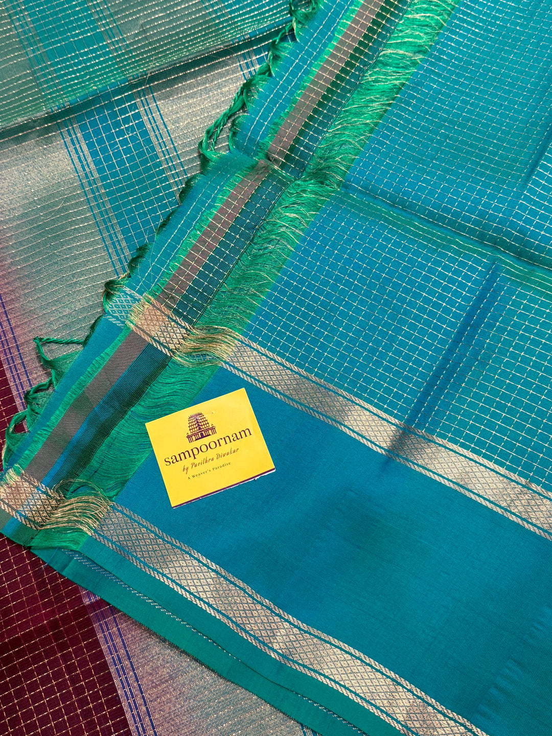 Dark Jamun  With Turquoise Blue ,rich zari podi kattam in the body,traditional rettapet borders and rich Pallu Pure Soft Silk Saree