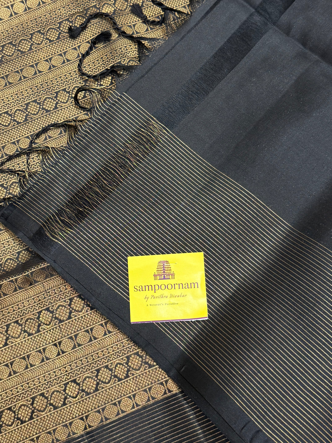 Manjal With Black vairasoosi lines in the border, rich  zari butta in the body and grand traditional Pallu Pure Soft Silk Saree