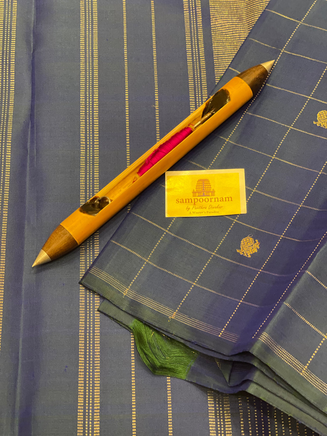 A Traditional Mayilkazhuthu Blue with Mayil Chakram Body Checks Butta and Traditional Pallu - Pure Kanjivaram Silk Saree