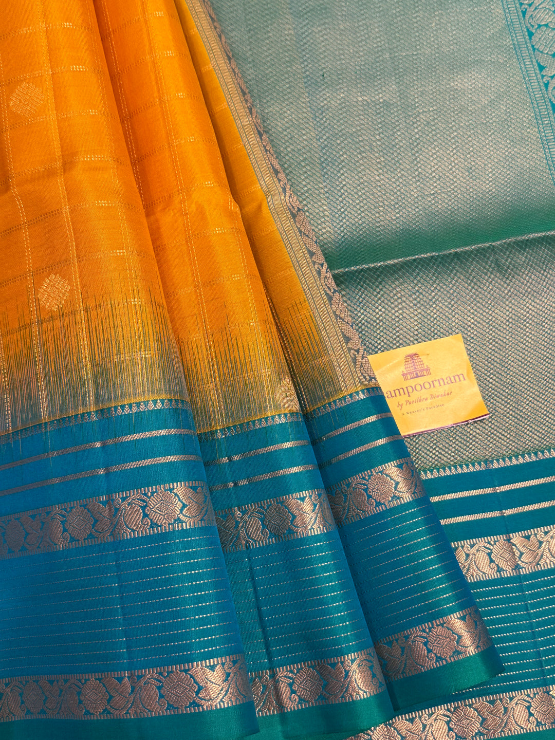 Yellow With Turquoise Blue ,zari butta with zari checks all over the body rettapet traditional borders and rich pallu Pure Soft Silk Sarees