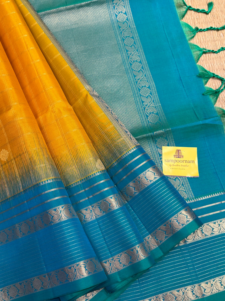 Yellow With Turquoise Blue ,zari butta with zari checks all over the body rettapet traditional borders and rich pallu Pure Soft Silk Sarees