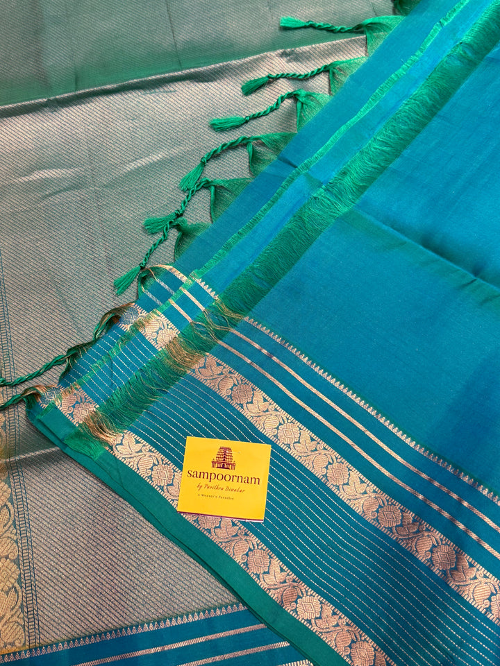 Yellow With Turquoise Blue ,zari butta with zari checks all over the body rettapet traditional borders and rich pallu Pure Soft Silk Sarees