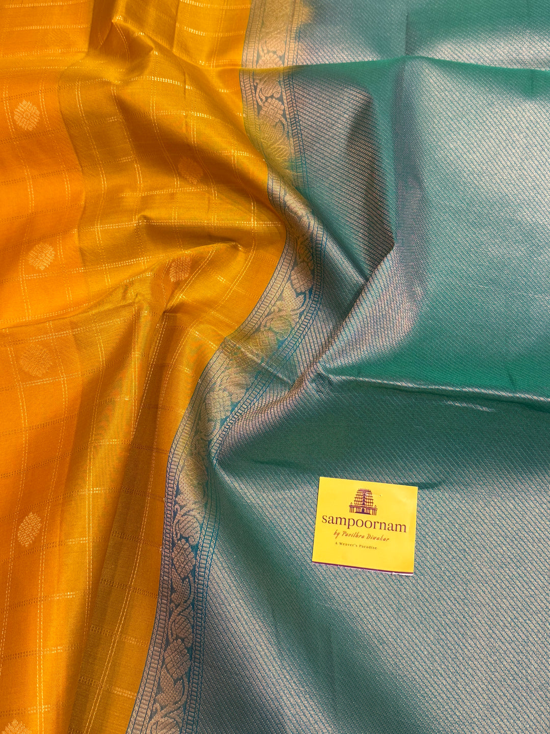 Yellow With Turquoise Blue ,zari butta with zari checks all over the body rettapet traditional borders and rich pallu Pure Soft Silk Sarees