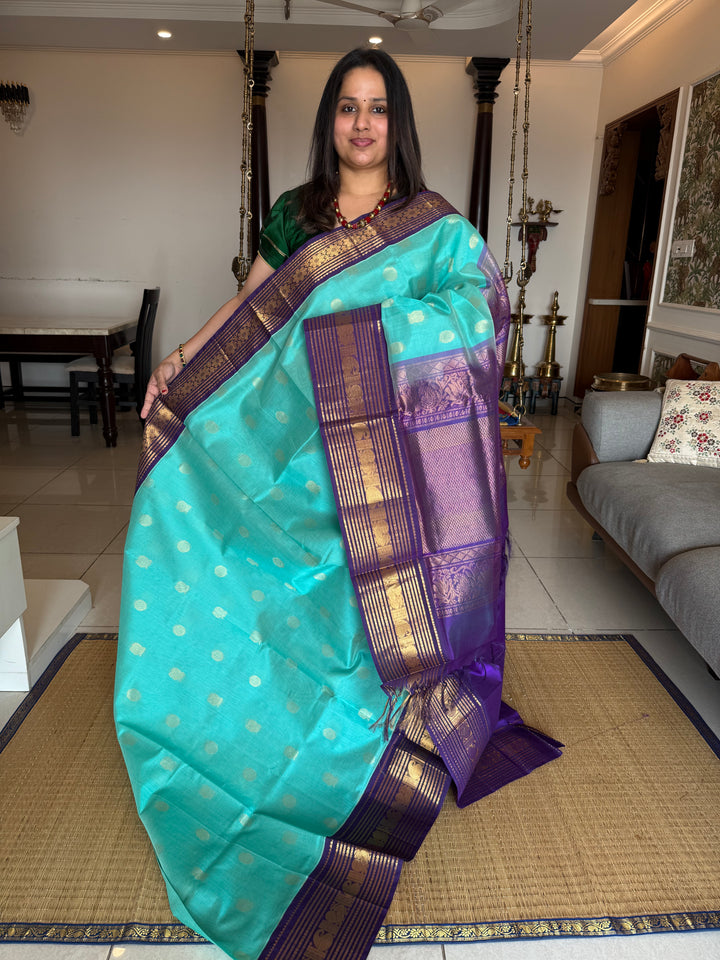 Light Blue with Dark Blue ,Kanchi Rich Border with Annam and Chakram Rich Butta in the Body and Grand Pallu Korvai Silk Cotton Saree