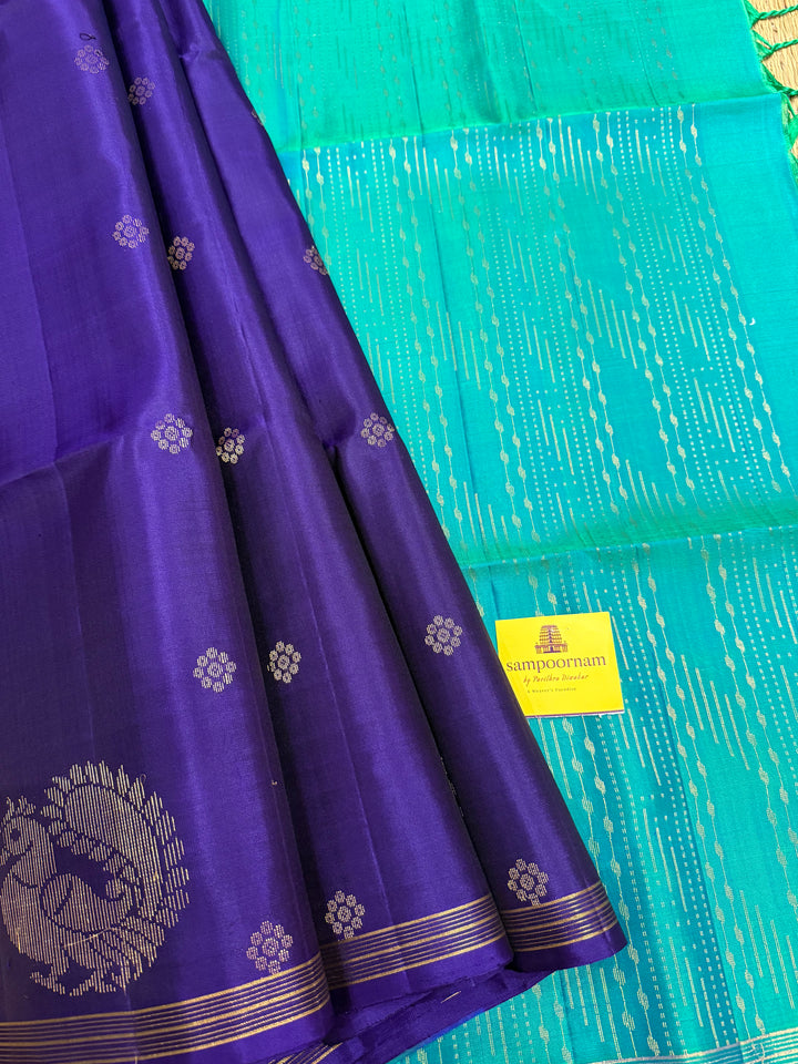 Dark Blue With Turquoise Blue , rich annam butta in the lower border and small zari buttas in the body, rich Pallu Pure Soft Silk Saree
