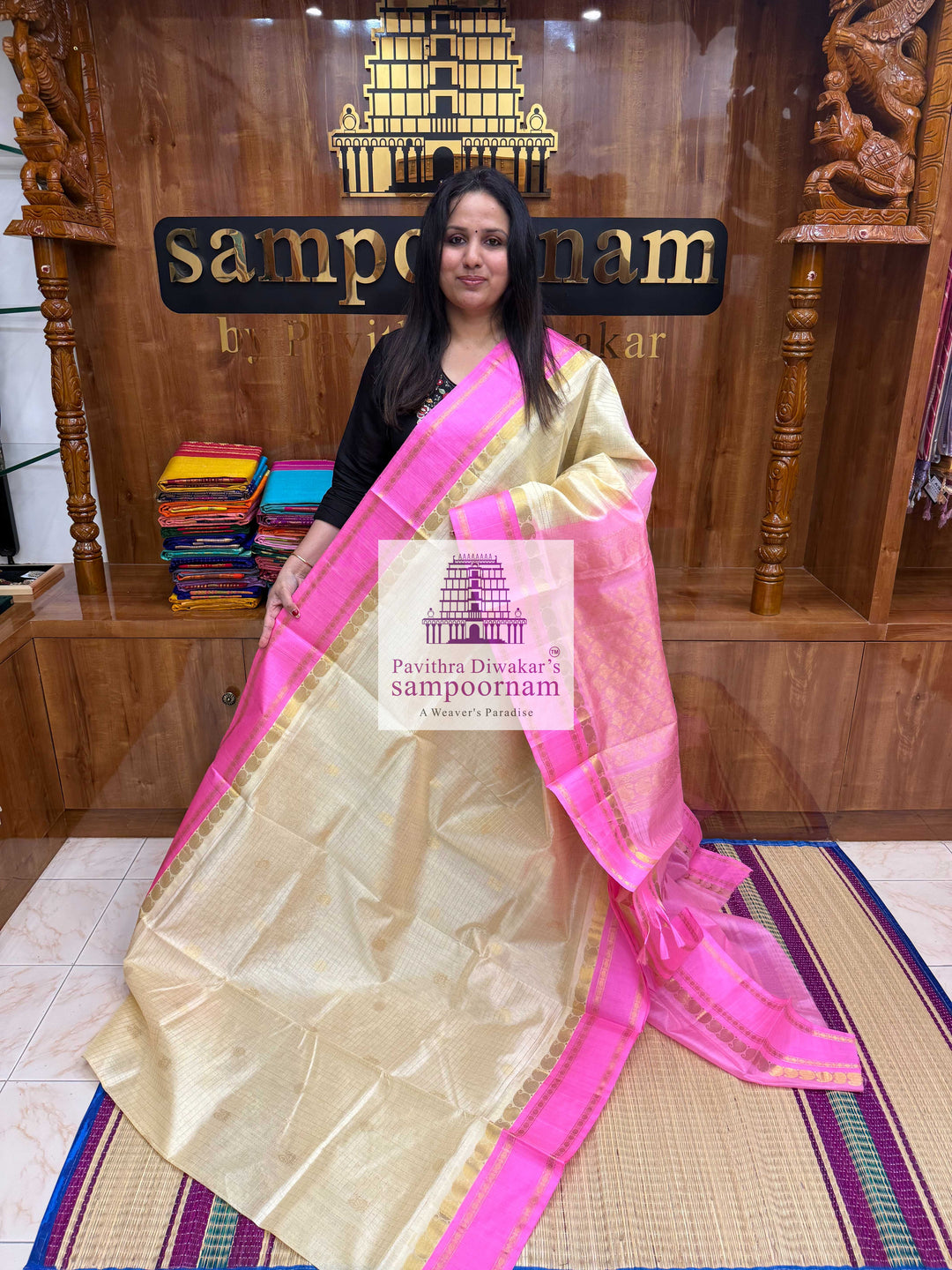 Cream with Baby Pink , Rich Zari checks and Annam Zari butta in the body , Rettapet border and Rich Pallu Korvai Silk Cotton Saree