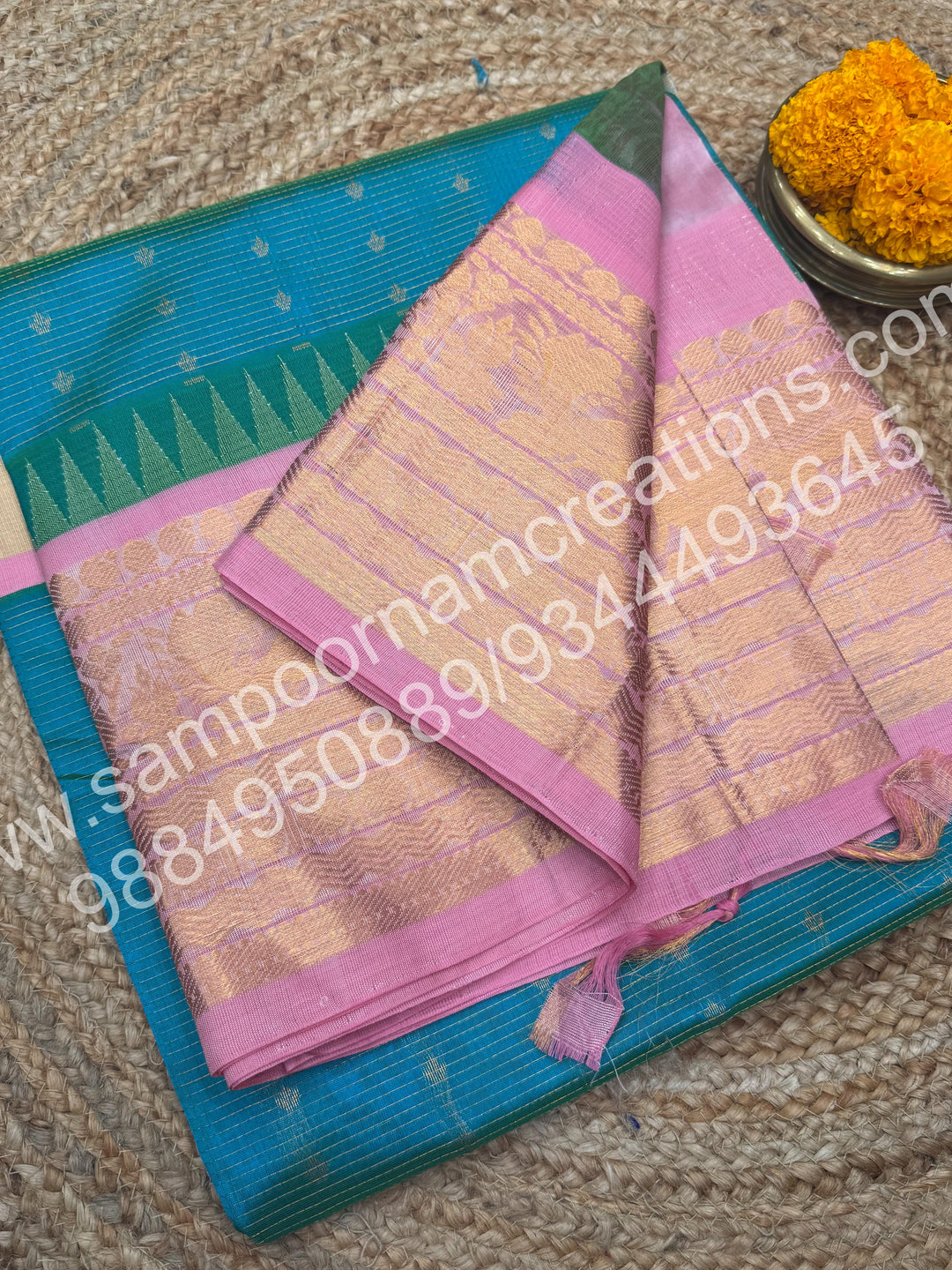 Turquoise Blue with Baby Pink , Rich Zari checks with Floral butta  and Traditional one side long border ,  rich Pallu Pure Korvai Silk Cotton Saree