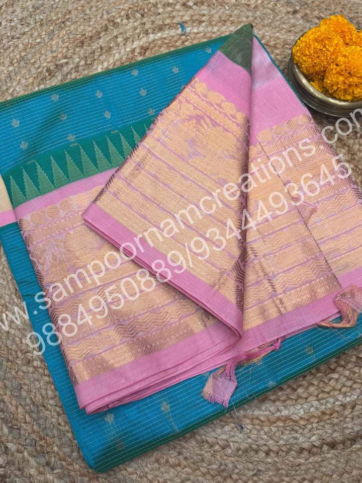 Turquoise Blue with Baby Pink , Rich Zari checks with Floral butta  and Traditional one side long border ,  rich Pallu Pure Korvai Silk Cotton Saree