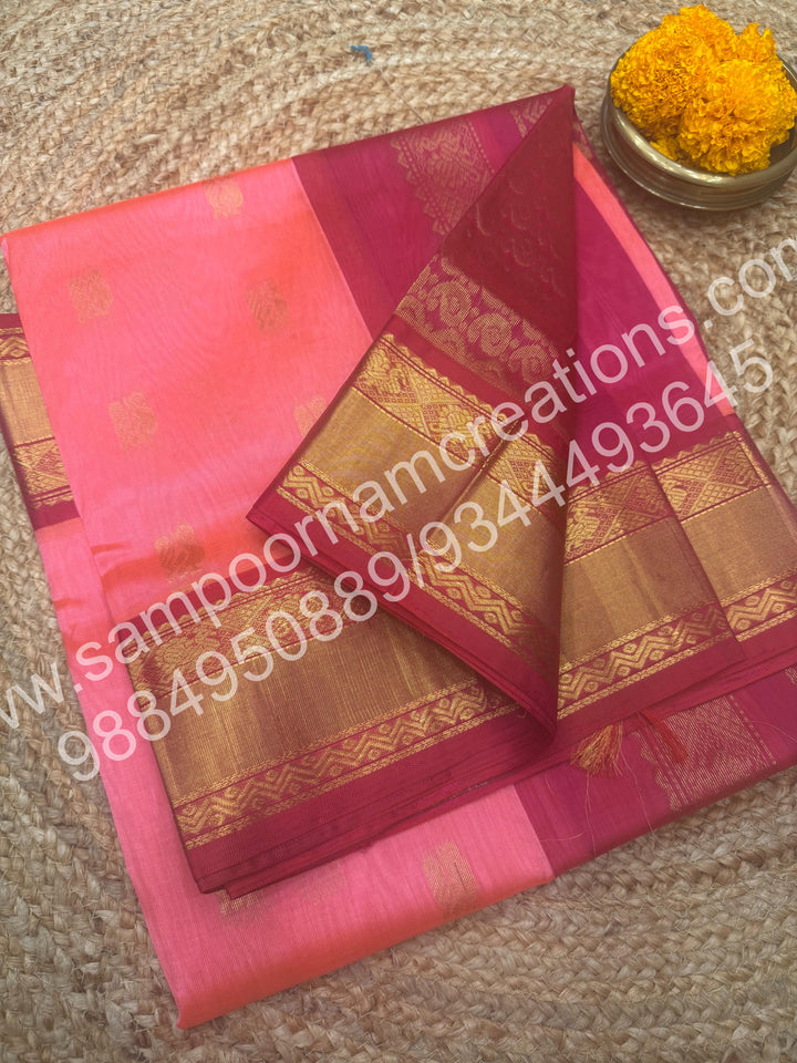 Peachish Pink with Dark Pink , Rich Annam Zari Butta in the body with rettapet Silk border , rich Pallu Pure Korvai Silk Cotton Saree