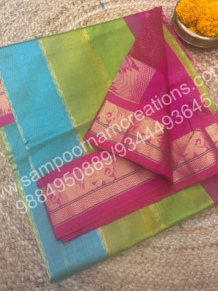 A Fusion of Pastel Shades of Sea Green with Pink , Traditional border and  rich Pallu Pure Korvai Silk Cotton Saree