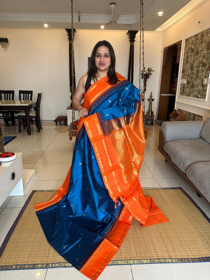 Blue with Orange Zari butta Temple Rettapet Border, Rich Pallu Korvai Silk Cotton Saree