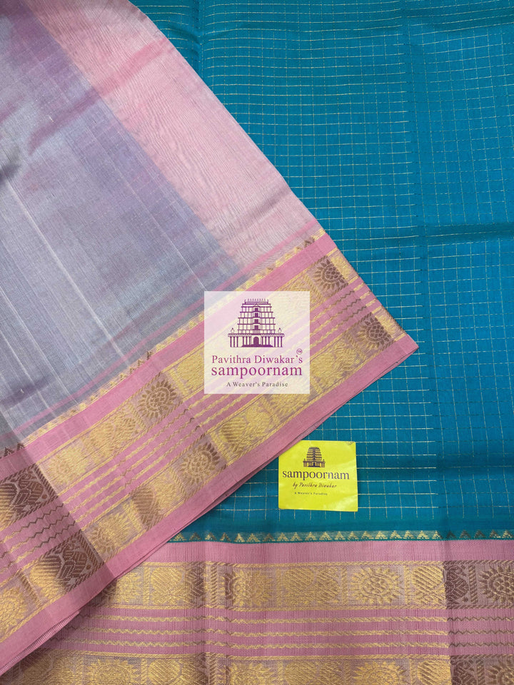 Turquoise Blue with Baby Pink , Rich Zari checks in the body and Rettapet border , Grand Pallu Korvai Silk Cotton Saree