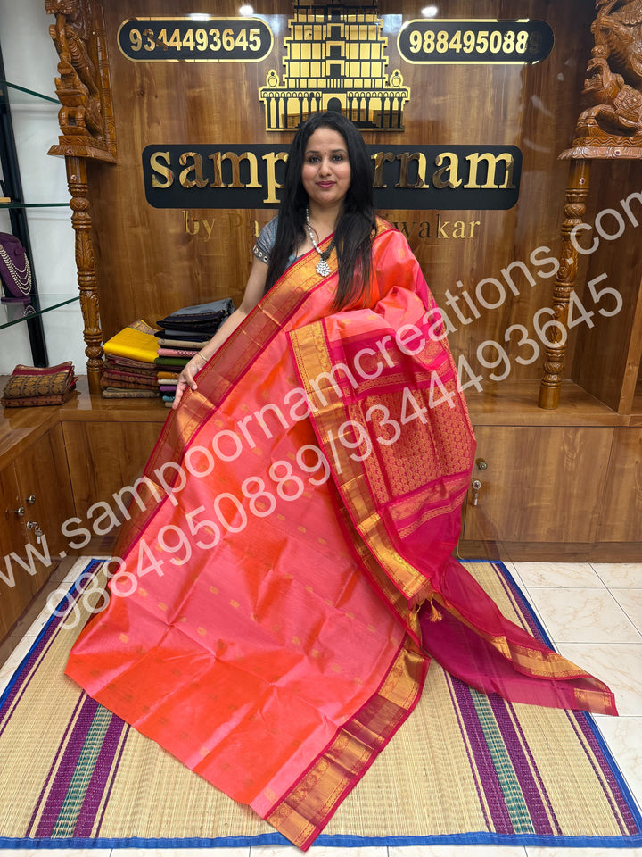 Peachish Pink with Dark Pink , Rich Annam Zari Butta in the body with rettapet Silk border , rich Pallu Pure Korvai Silk Cotton Saree