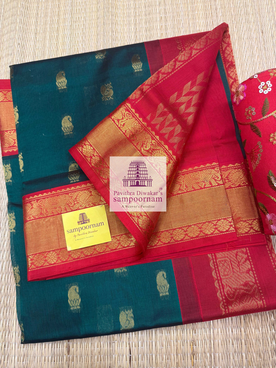 Dark Green with Red , Rich Zari butta in the body traditional Silk border and Rich Pallu Korvai Silk Cotton Saree