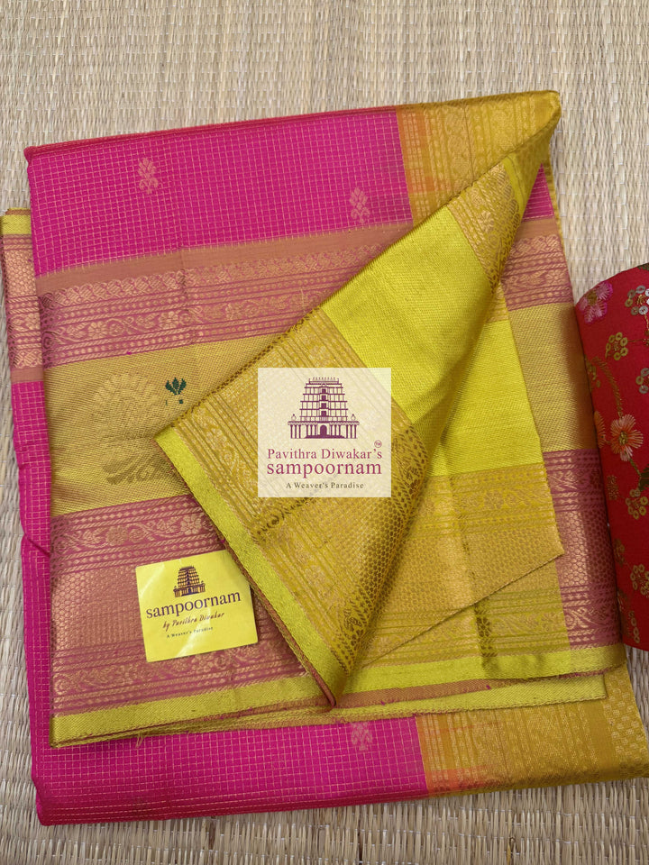 Pink with Lemon Yellow , Zari floral butta in the body , one side big Satin border with Annam motif , traditional border and  Grand Pallu Korvai Silk Cotton Saree