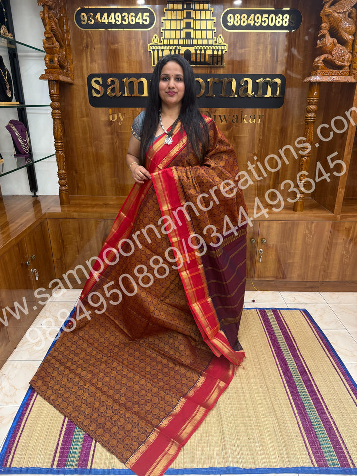 Maroon with Red , Rich Mayil and Chakram thread work in the body with Rettapet border , rich Pallu Pure Chettinad Cotton Saree