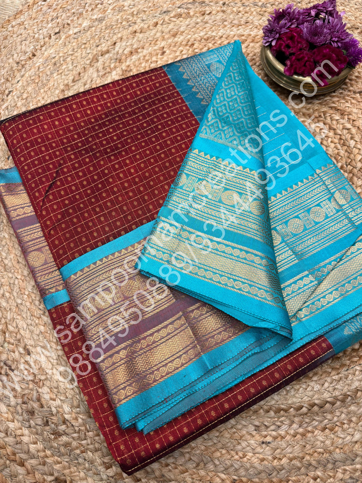 Dark Maroon  with Turquoise Blue , Rich Traditional Borders and Lakshadeepam Zari Butta all over the body and Grand Pallu , Pure Silk Cotton Saree