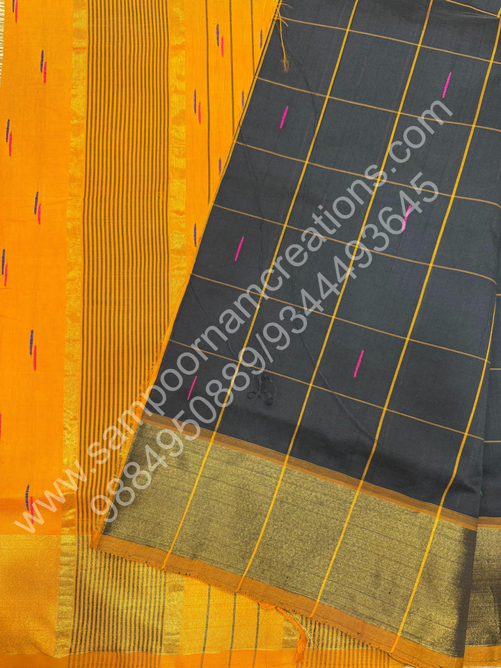 Black with Orange , checks in the body and rain drop thread butta in the body and Pallu Semi Silk Cotton Saree