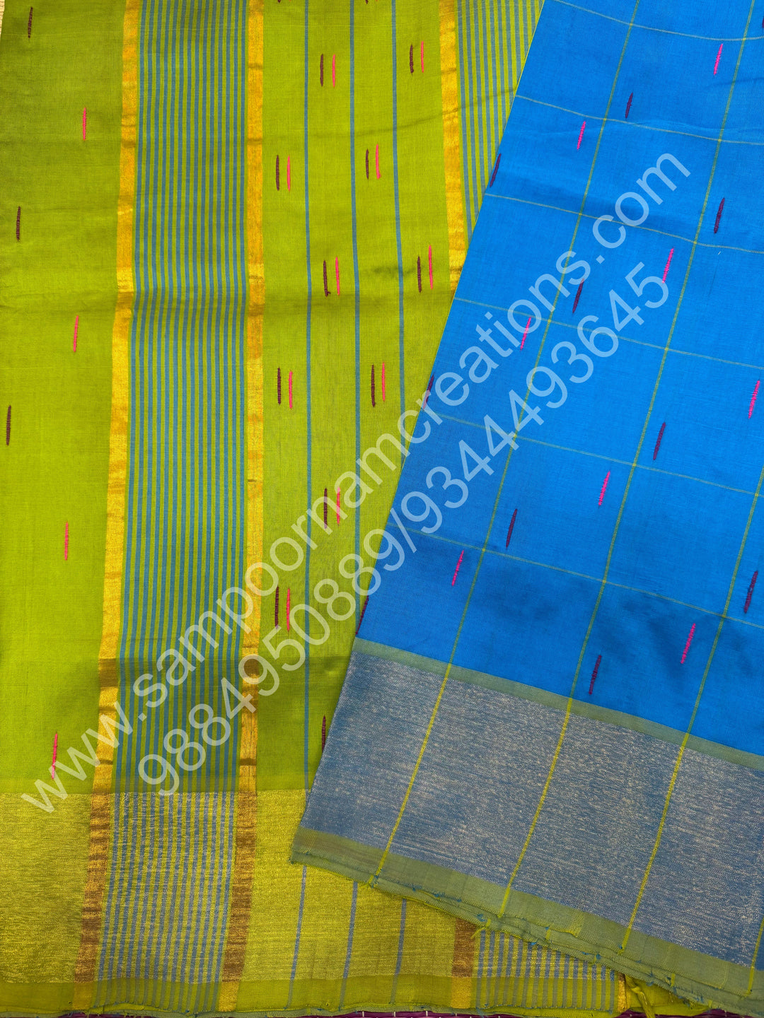 Blue with Green , checks in the body and rain drop thread butta in the body and Pallu Semi Silk Cotton Saree