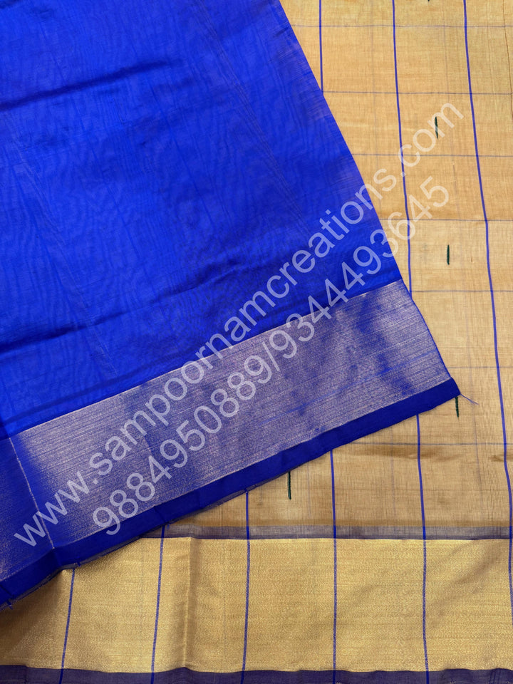 Buscuit colour with Blue , checks in the body and rain drop thread butta in the body and Pallu Semi Silk Cotton Saree