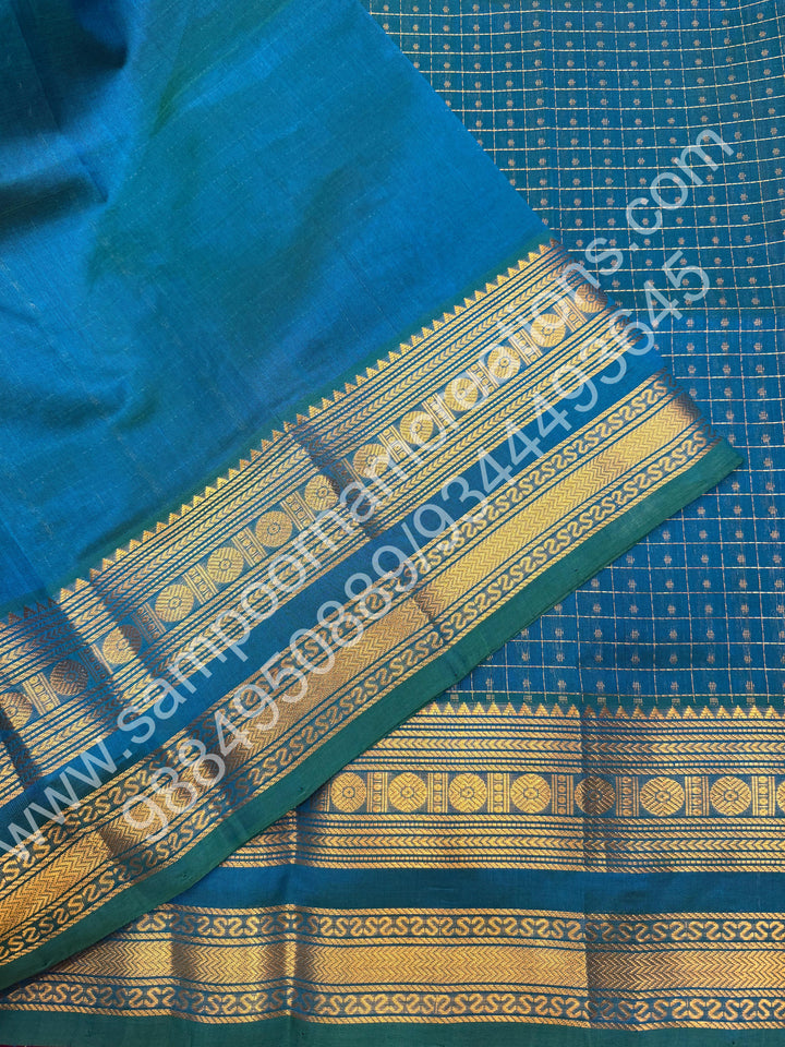 Mayilkazhuthu Green , Rich Traditional Borders and Lakshadeepam Zari Butta all over the body and Grand Pallu , Pure Silk Cotton Saree