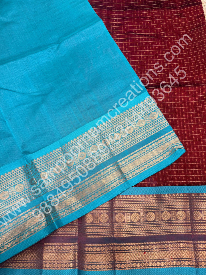 Dark Maroon  with Turquoise Blue , Rich Traditional Borders and Lakshadeepam Zari Butta all over the body and Grand Pallu , Pure Silk Cotton Saree
