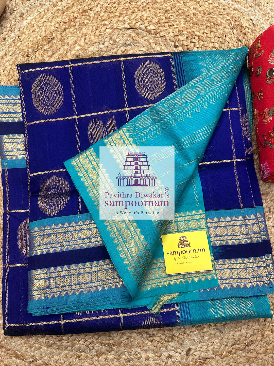 Dark Blue with Blue  , rich Zari checks in the body , Mayil and Chakram rich butta in the body , rettapet borders and rich Pallu Silk Cotton Saree