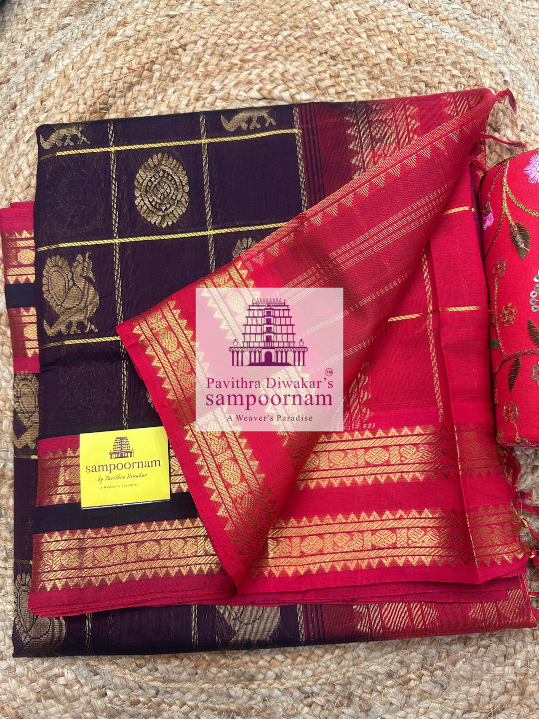 Brown with Red , rich Zari checks in the body , Mayil and Chakram rich butta in the body , rettapet borders and rich Pallu Silk Cotton Saree