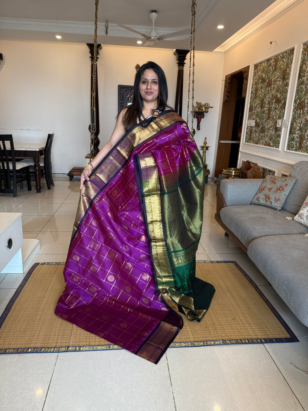 Purple with Green , Zari Kattam in the body with mayil and Chakram butta , traditional borders and rich Pallu , silk cotton saree