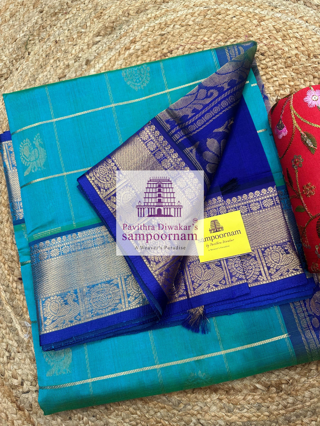 Ramar Green with Blue  , rich Zari checks in the body , Mayil and Chakram rich butta in the body , traditional borders and rich Pallu Silk Cotton Saree