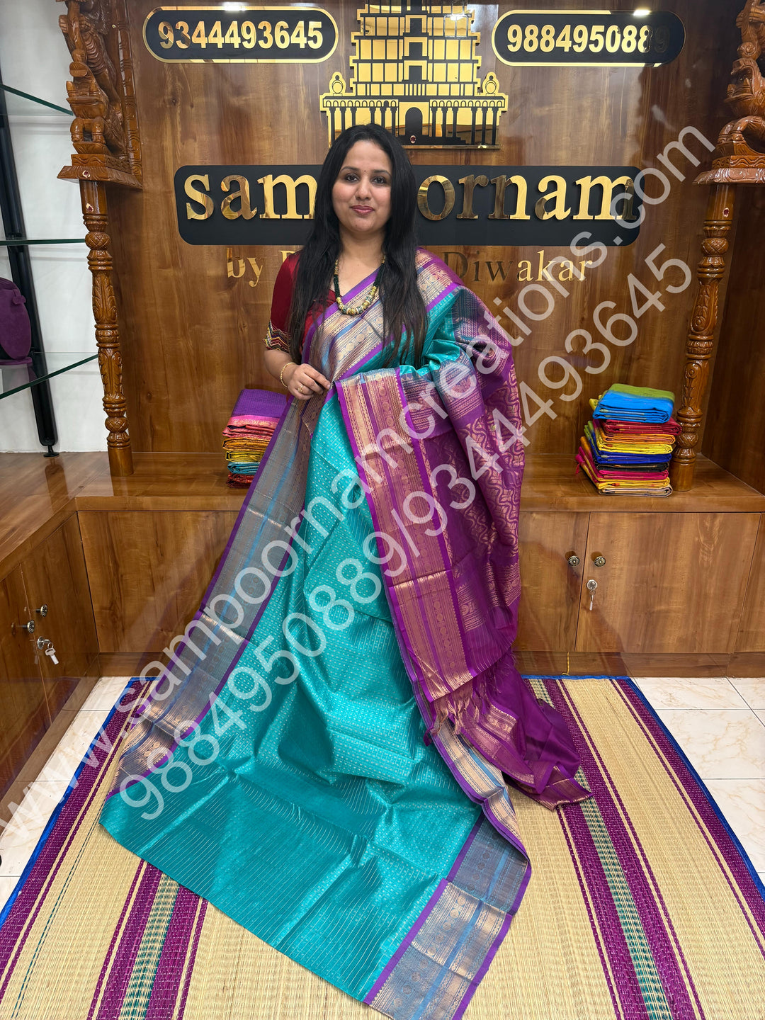 Turquoise Blue with Purple , Rich Traditional Borders and Lakshadeepam Zari Butta all over the body and Grand Pallu , Pure Silk Cotton Saree