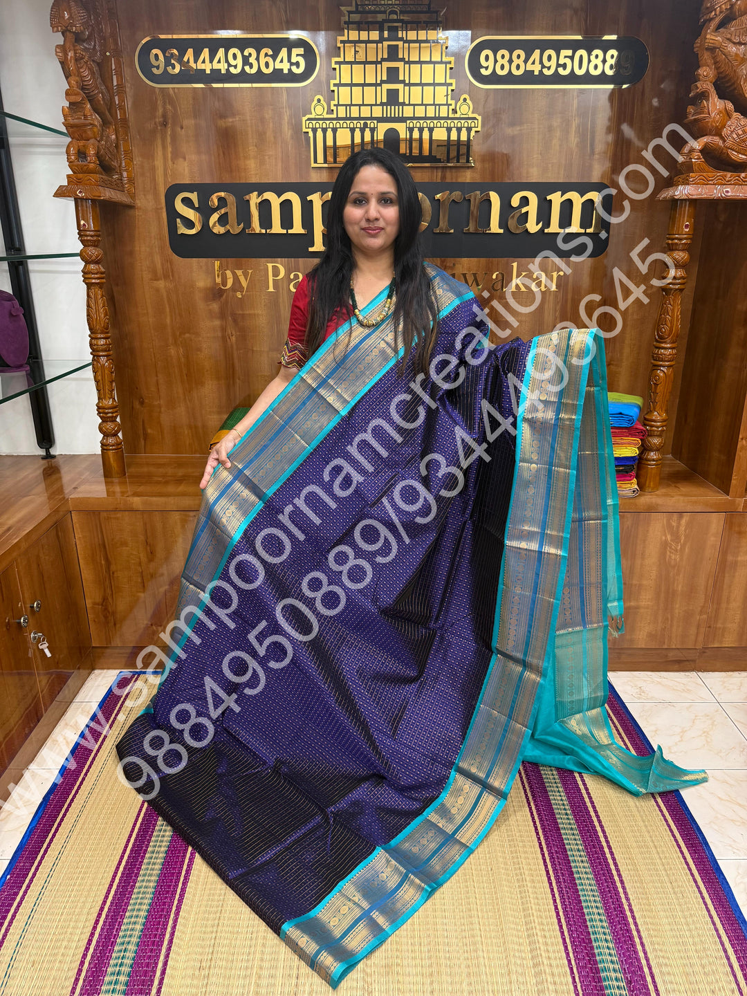 Dark Blue with Turquoise Blue , Rich Traditional Borders and Lakshadeepam Zari Butta all over the body and Grand Pallu , Pure Silk Cotton Saree