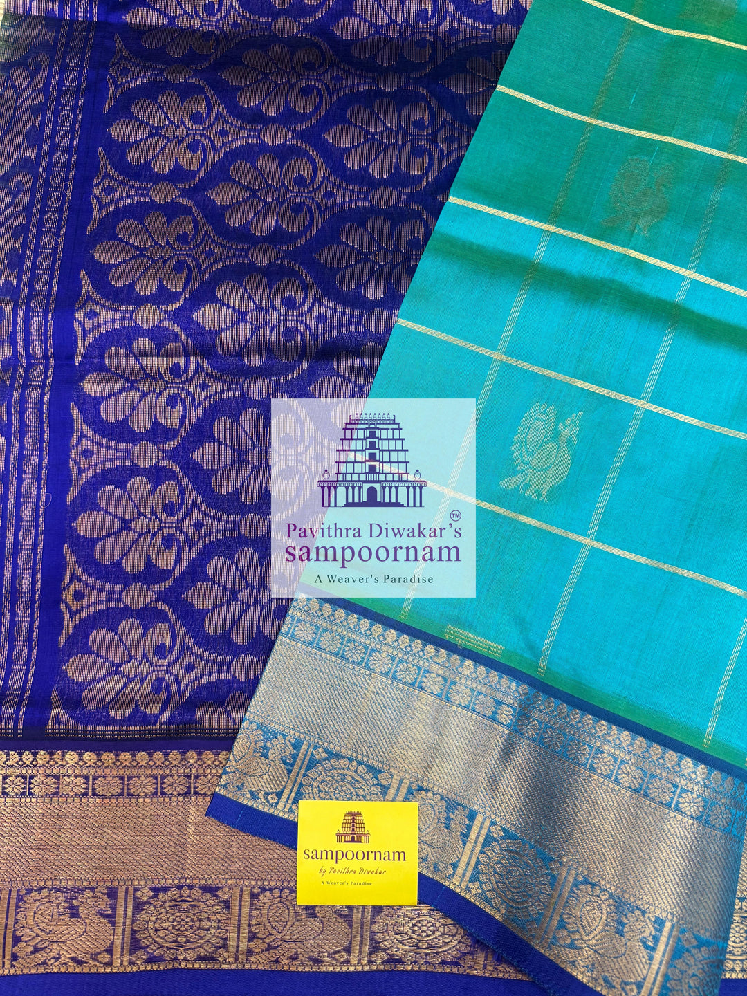 Ramar Green with Blue  , rich Zari checks in the body , Mayil and Chakram rich butta in the body , traditional borders and rich Pallu Silk Cotton Saree