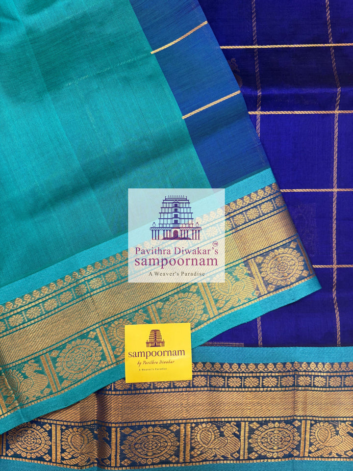 Dark Blue with Turquoise Blue  , rich Zari checks in the body , Mayil and Chakram rich butta in the body , traditional borders and rich Pallu Silk Cotton Saree