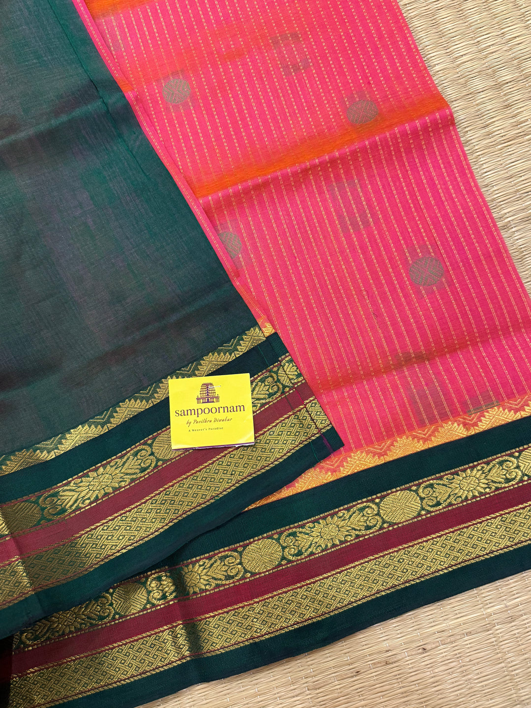 Magenta with Green , rich zari butta and vertical zari lines in the body, traditional borders  and rich Pallu Korvai Silk Cotton Saree